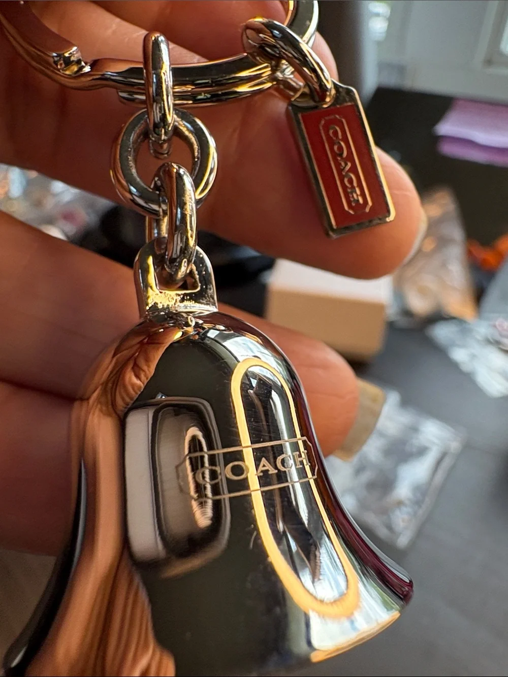 COACH Rare Vintage Polished Silver Bell Keychain with Red Tag - NWOT